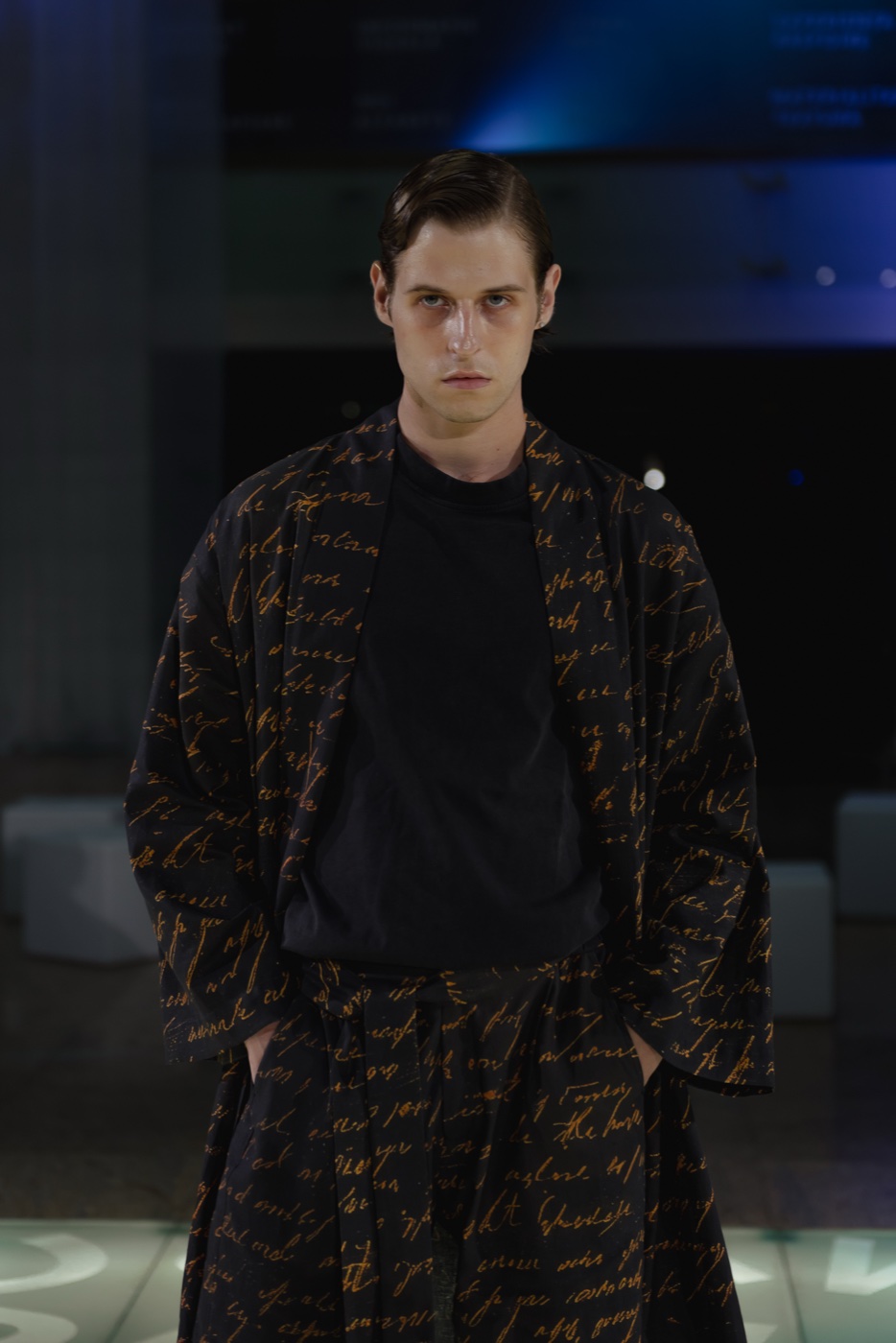Akasha runway, dark manuscript-print robe