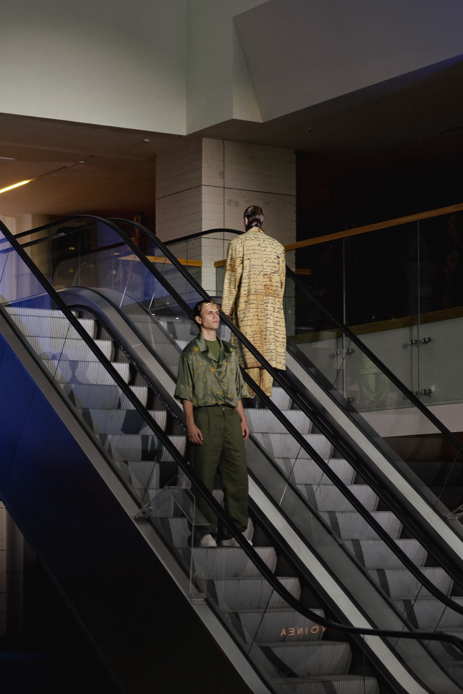 Akasha backstage, escalator with two looks