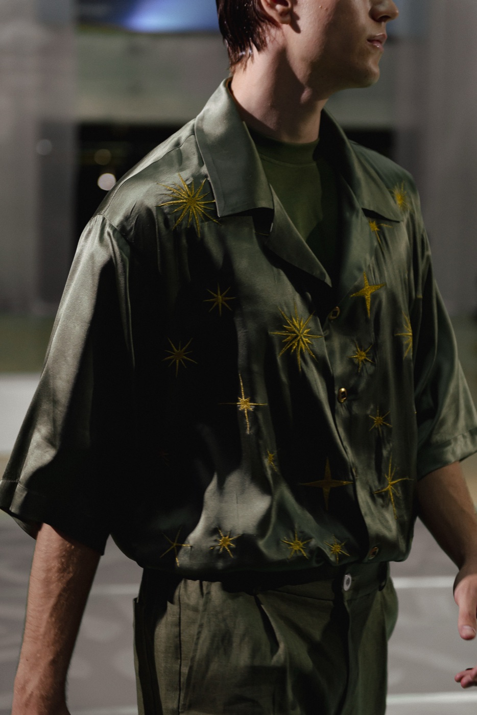 Akasha detail, olive star-embroidered shirt
