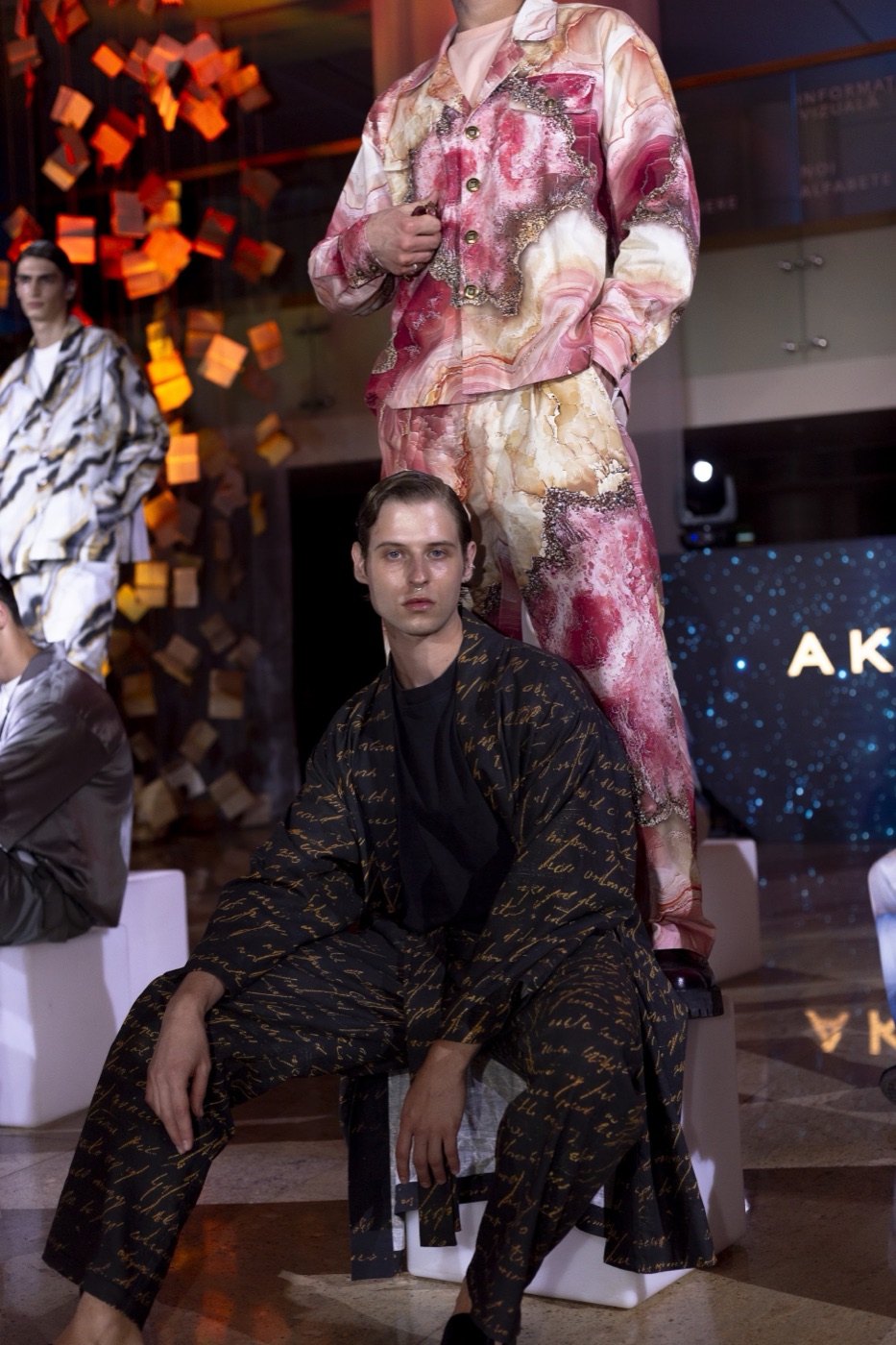 Akasha runway, marbled jacket and script-print looks