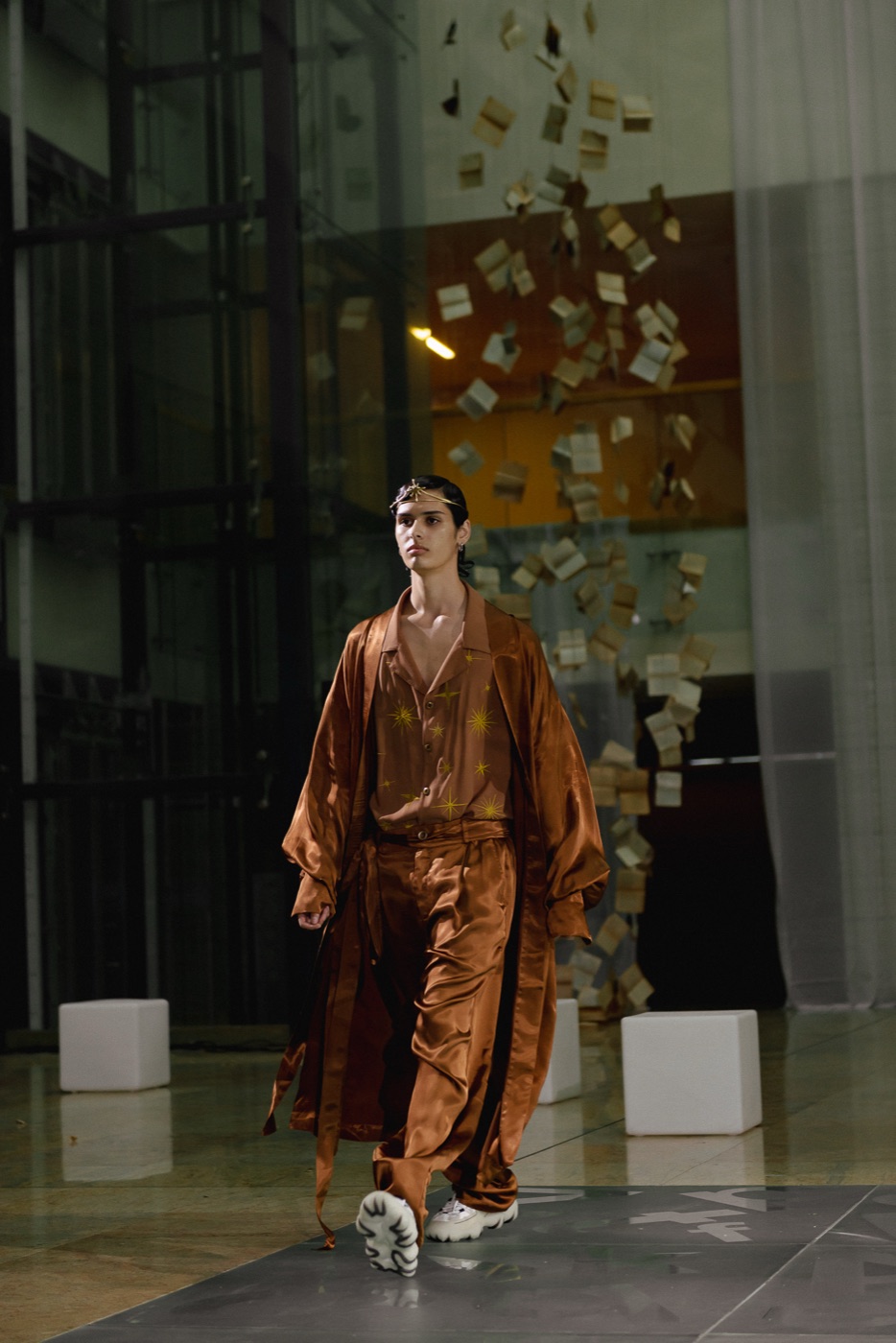Akasha runway, bronze star-embroidered look walking