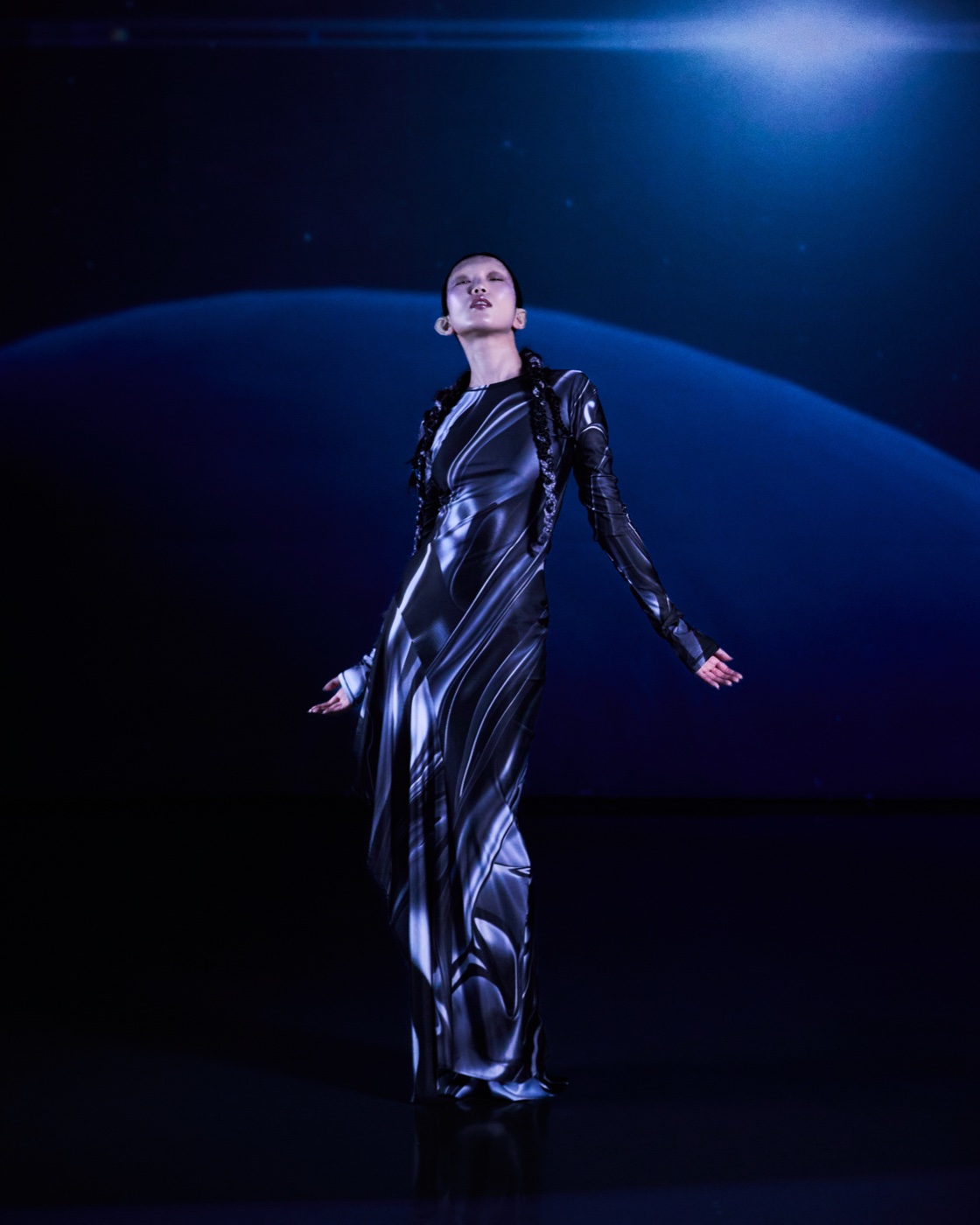 Origin campaign, moon-textured gown against ringed planet