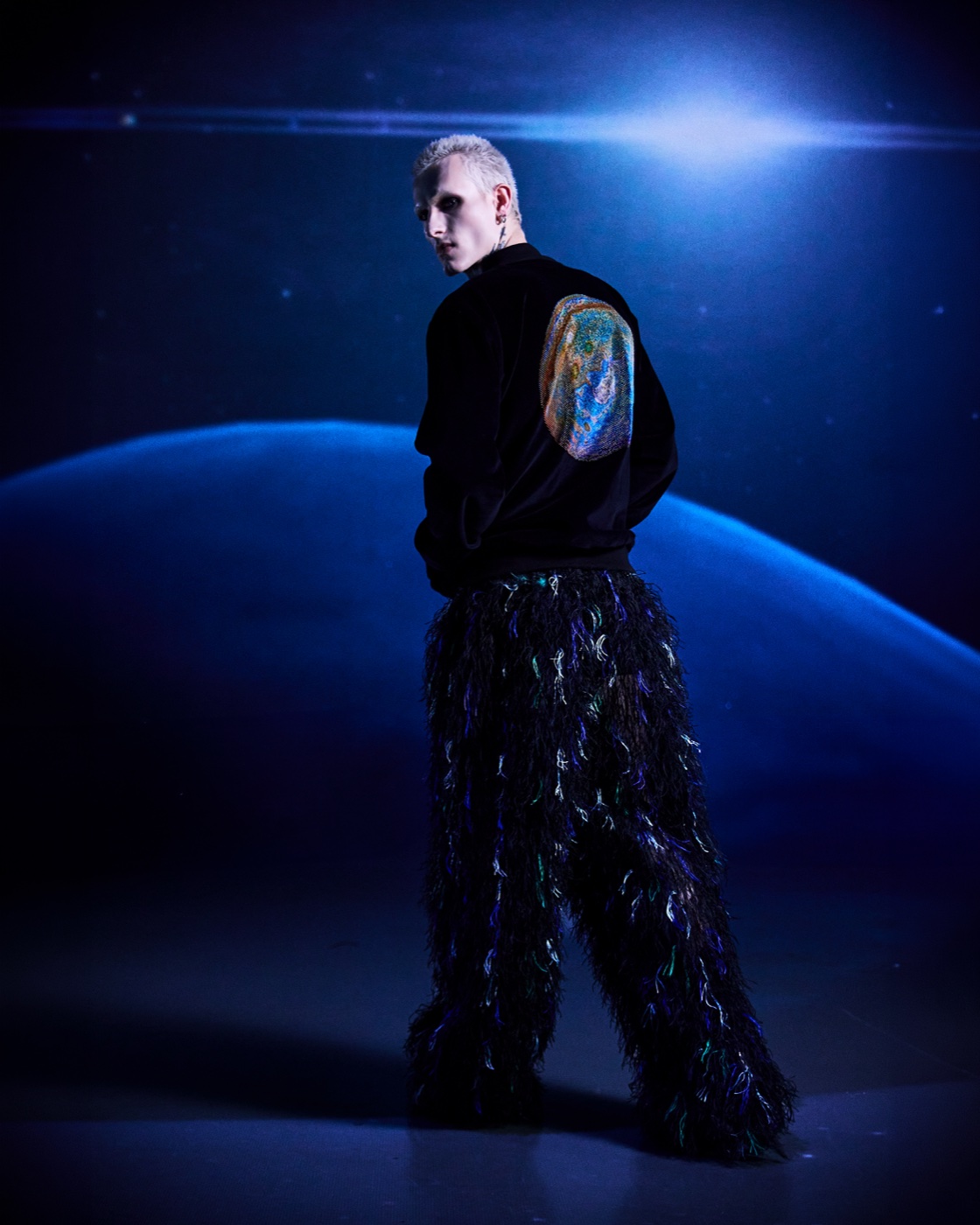 Origin campaign, feathered trousers and cropped jacket, back view