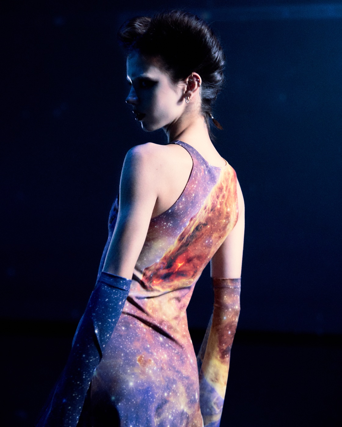 Origin campaign, galaxy-print dress with opera gloves, back view