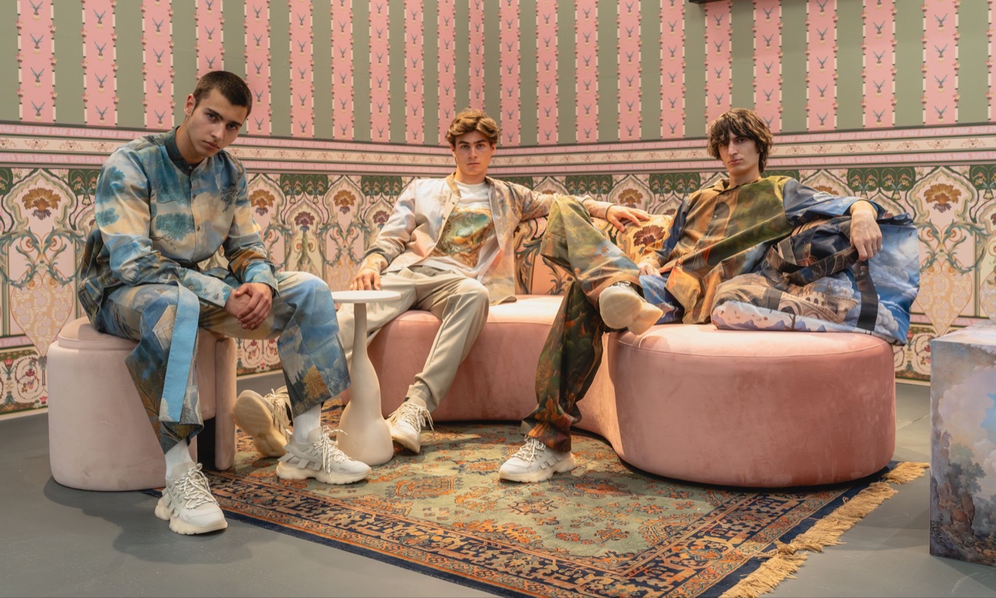 Window to a New World campaign, group portrait on pink poufs