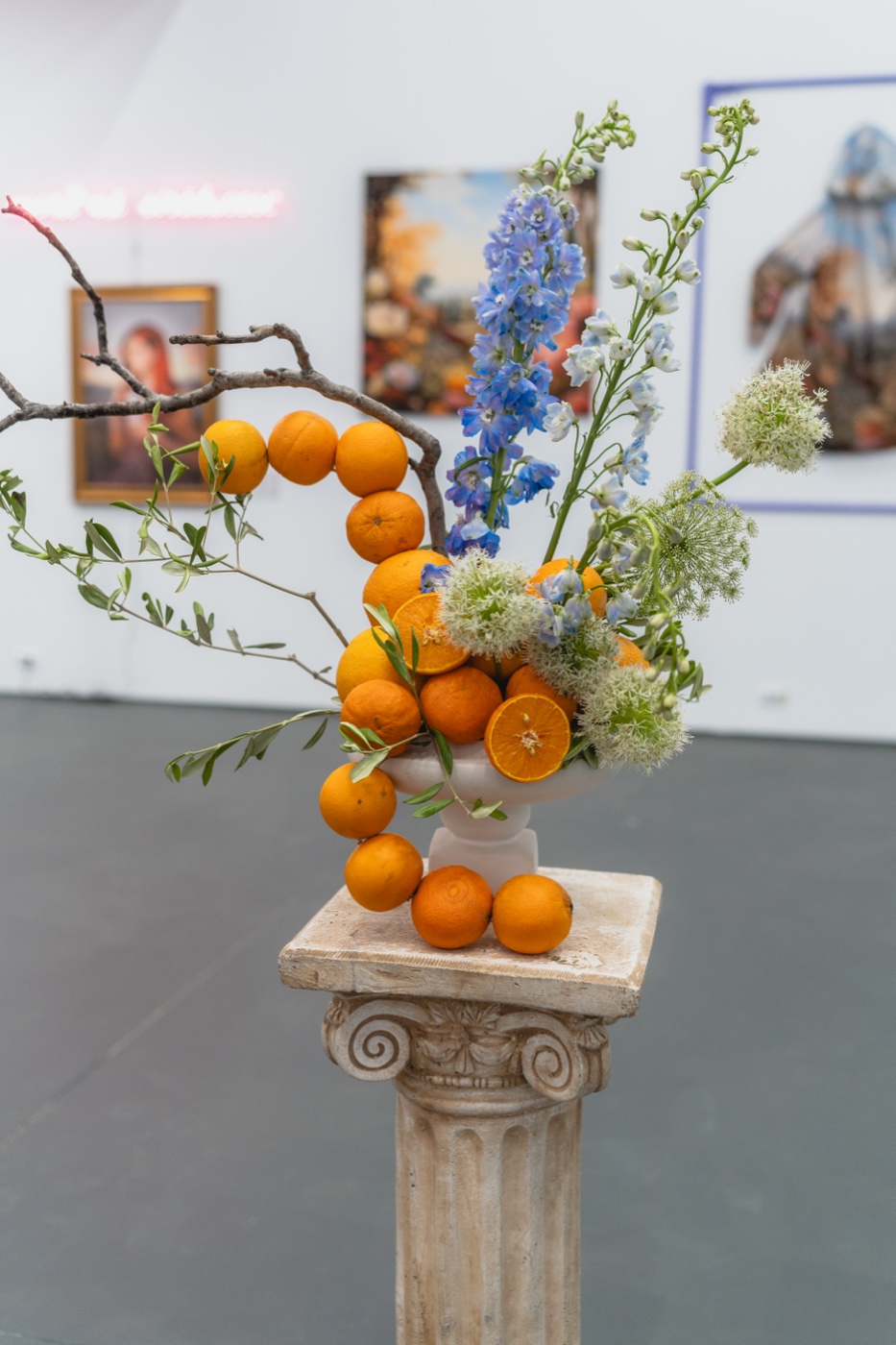 Window to a New World exhibition, orange garland installation